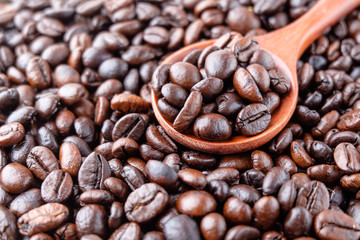 coffee beans on wooden background