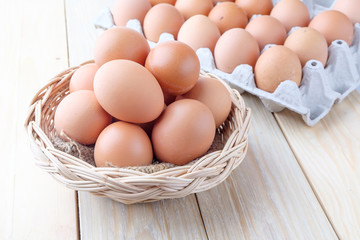fresh chicken egg on wooden background