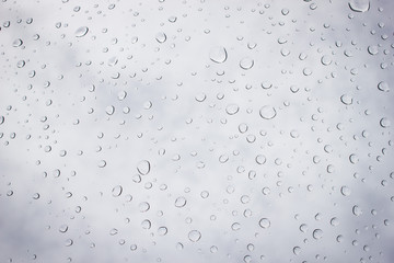 Raindrops on glass. Water drops on mirrors. Dirty mirrors in rainy day.