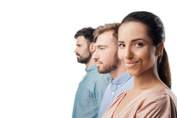 side view of young businesswoman and businessmen standing in line isolated on white