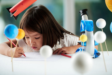 Fototapeta premium Little Girl Creating Work of Art