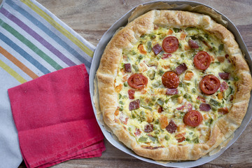 Quiche Lorraine pie with variety of vegetables
