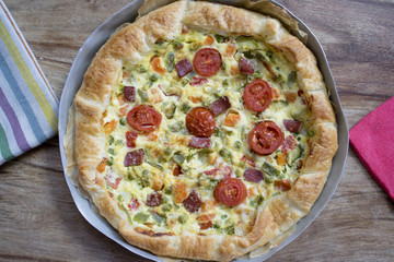 Quiche Lorraine pie with variety of vegetables