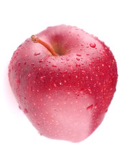 Plakat Red apple on a white background with droplets