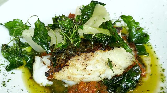 Sea bass steak with sauce
