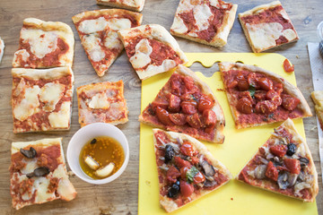 assortment of pieces of homemade pizza