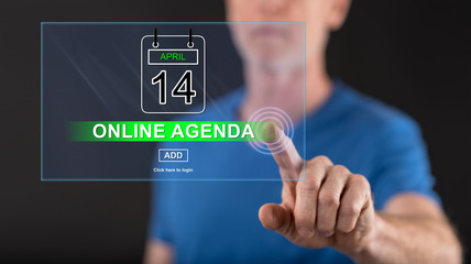 Man touching an online agenda concept on a touch screen