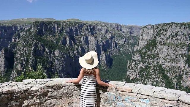 little girl on the viewpoint Vikos gorge Greece