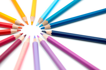 Fototapeta premium Group of color pencils isolated on white background, Colored pencils can be used as background and add text or word, Wooden colored pencils and free space