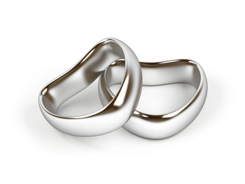 Heart shaped silver rings on white background. 3d image