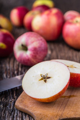 Apple. Red Apples in other positions on wooden board