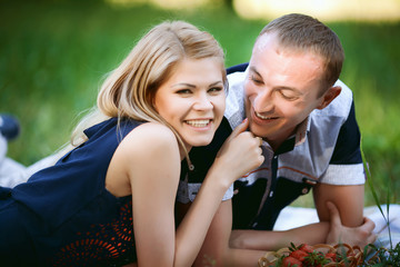 couple lying in grass