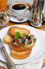 Breakfast with croutons and coffee