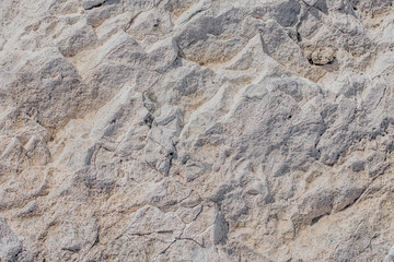 weathered natural pattern of stone surface, close-up\
