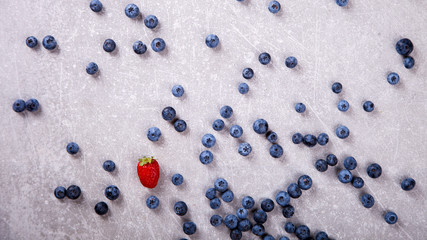 Various fresh summer Berries on the Gray Background. Mix Berries .Raspberry and  Blueberry.Food or Healthy diet concept.Super Food.Vegetarian.Top View.Copy space for Text.selective focus.