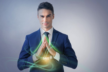 Attractive businessman is demonstrating safety