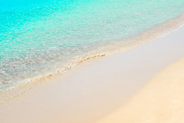 Fototapeta na wymiar Beautiful light blue seashore, italian beach in Salento, natural marine background