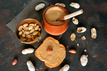 Homemade cream of peanut on table of stone