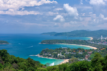 Tropical beach landscape with beautiful turquoise ocean waives and sandy coastline from high view point. Kata and Karon beaches, Phuket, Thailand