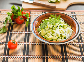 Healthy food. Fresh cucumber salad