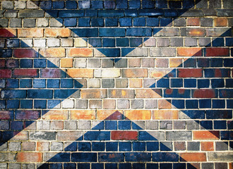 Scotland flag on a brick wall background