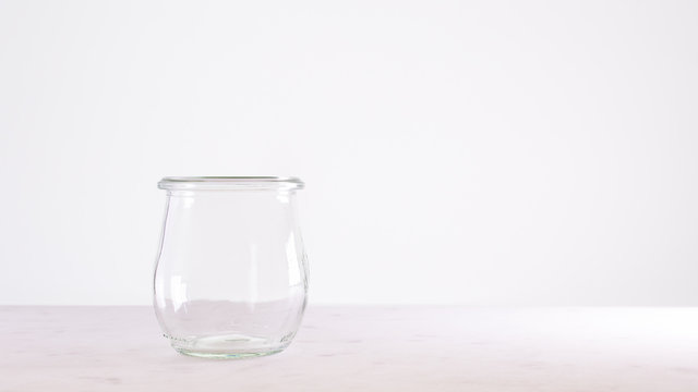 Empty jar on white