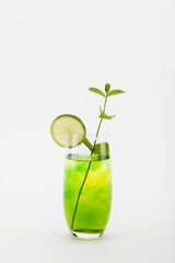 homemade refreshing drink with lime and mint twig isolated on white