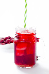 Summer iced drink - tea or juice with ice and berries