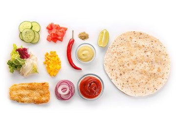Ingredients for fish tacos on white background