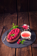 Delicious raspberry chocolate tart with ricotta cheese