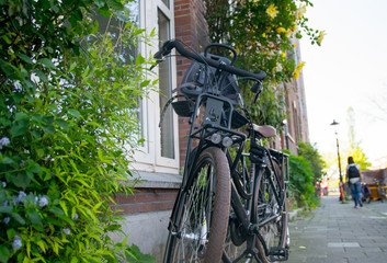 Fototapeta na wymiar Retro style bicycle. Country village in the Netherlands
