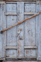 old metal door closed on constipation with lock