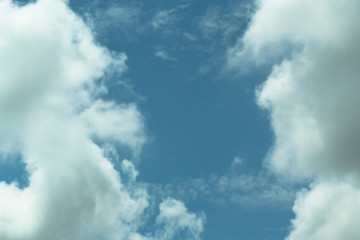 Clouds are divided into layers in the evening with light.