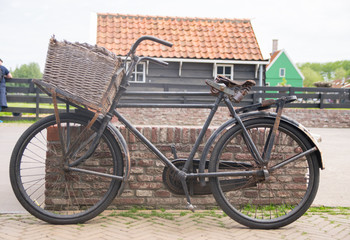 Naklejka na ściany i meble Beautiful view of old bicycle with basket