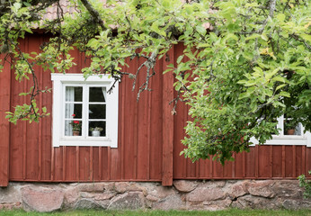 Fototapeta na wymiar Detail of a typical red house in Sweden