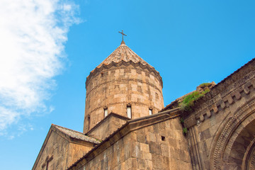 Fototapeta na wymiar Monastery Tatev, the dome of the church and the bright blue sky. Armenia.