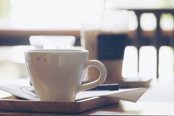 Hot coffee in cafe, dirty coffee cup