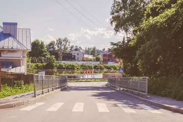 Naklejka premium old town street road and a river in summer vologda, russia