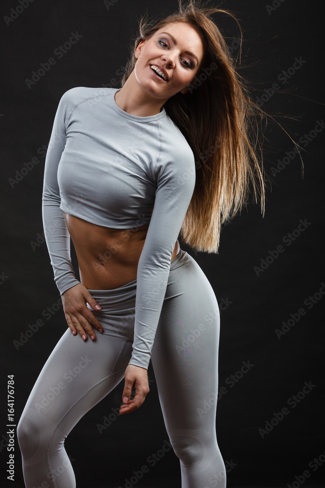 Wall mural Sport fit woman in thermal clothes.