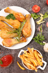 grilled chicken leg with french fries
