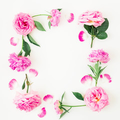Floral frame of pink flowers on white background. Floral composition. Flat lay, top view.