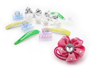 various hair accessories for young girls on a white background