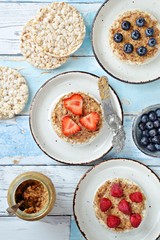 Rice cake with peanut butter and berries