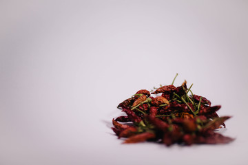 Obraz premium Red pepper spicy on a white background