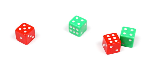 Red and green gambling dice isolated on white background