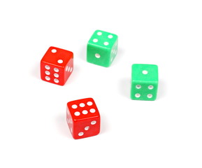 Red and green gambling dice isolated on white background