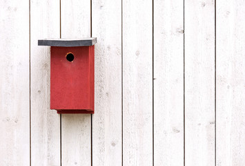 Red bird nesting box