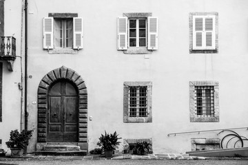Facade of an old house in Lucca, Italy.