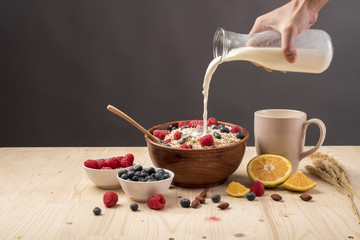 Fototapeta premium Healthy breakfast ingredients on wood table, Healthy food concept