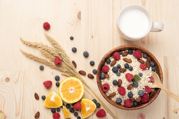 Fototapeta na wymiar Healthy breakfast ingredients on wood table, Healthy food concept